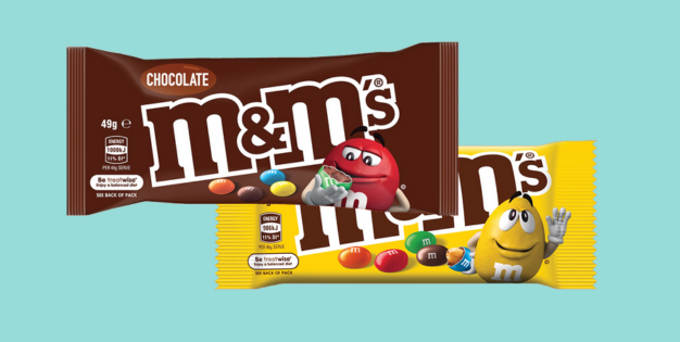 Two MnM packs on a blue background